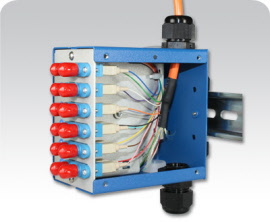 snap patch panel populated with cabling (side removed)